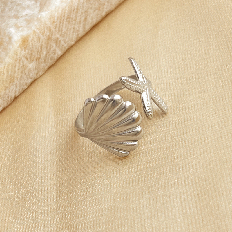 Anillo ajustable estrella y concha